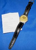 WATCH: Shakespeare gilt finish wrist watch, 33mm casing, gold face with Shakespeare logo, leather