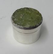 A modern silver box, by Evelyn Weller set with jade style stone carved with a phoenix bird, height