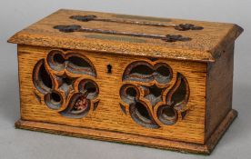 A 19th century oak correspondence box The hinged rectangular cover with apertures labelled Answered