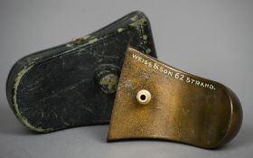 A late 19th century leather cased ear trumpet Of typical form, with an ivory earpiece,
