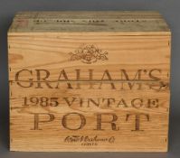 Graham's Vintage Port, 1985 Twelve bottles in old wooden case.