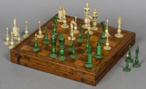 A 19th century ivory chess set Comprising: white and green stained ivory pieces;