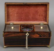 A Regency line inlaid rosewood tea caddy Of sarcophagus form,