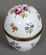 An 18th century enamelled table top pomander The hinged cover and body decorated with floral sprays,