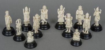 Twelve various late 19th/early 20th century Indian ivory figures Each mounted on an ebonised