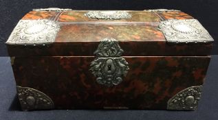 An antique silver plate mounted red stained tortoiseshell casket With hinged panelled domed top.