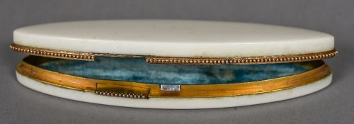 A 19th ivory patch box Of navette form, with a secret catch, the lid interior set with a mirror. 9.