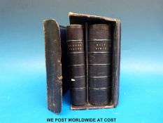 A cased leather Book of Common Prayer and matching Bible together with three volumes of 
