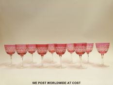 A set of ten flash overlaid cranberry glasses with geometric decoration,
