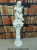 A decorative column plinth with putti statue (height 132cm)