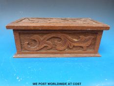 A carved oak box