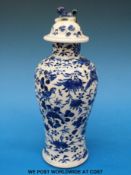 A 19thC blue and white Chinese vase with lid and four character mark (overall tall 23cm)