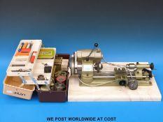 An Elliott Unimat-ST model makers lathe, complete with extra chucks, milling table etc.