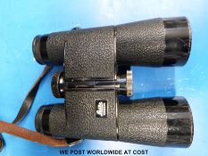 A pair of Leitz Trinovid 10 x 40 binoculars with case and strap