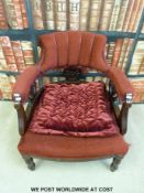 A 19th century red upholstered tub chair