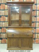 A 19thC mahogany cylinder bureau bookcase (W121 x D55 x H220cm)