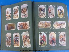 Two albums of cigarette cards to include recruiting posters,