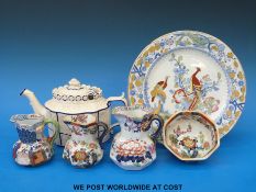 A Castleford teapot with relief decoration and  hinged lid, Masons jugs,
