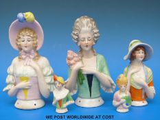 Five ceramic half dolls, the largest two 16.5cm tall, the smallest two 6.