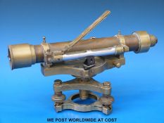 A brass surveyor's level with built in compass