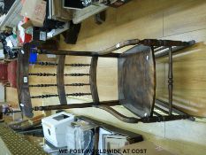 A spindle-back rocking chair