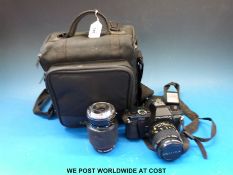 A Pentax P30 SLR camera with 70 - 210mm 1:4 - 5.