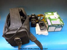 A collection of SLR and other cameras to include a Nikon F610, Olympus,