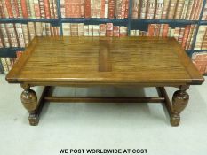A large oak coffee table (length 139cm)