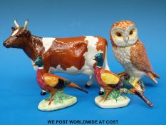 A collection of Beswick birds including a whitethroat and a Beswick trout