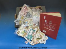 A collection of stamps, loose and in albums,