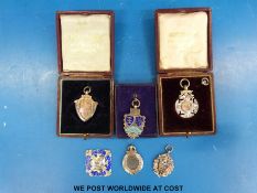 Five Essex silver football club badges,