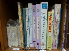 A quantity of Beatrix Potter and related books, together with a quantity of children's puzzle books,