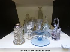 A quantity of cut and pressed clear glass including penny licks etc and silver-topped examples and