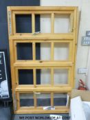 An unused pine window (minus glass) (H105 x L177cm)