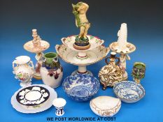 A collection of majolica items for restoration, including an Aesthetic period moon flask,