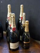 Six Moet and Chandon dummy champagne bottles