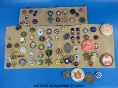 A collection of enamel badges to include cyclist's touring club,