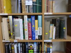 A selection of reference books including Miller's price guides,