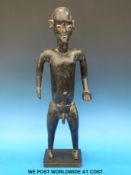 An African tribal figure (56cm tall)