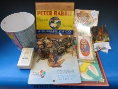 A collection of Peter Rabbit ephemera including a jigsaw, resin model of Benjamin Bunny,