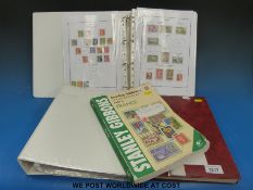 A collection of French stamps in two albums together with a catalogue and a stockbook of German