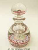 A 19thC English millefiori glass paperweight ink or scent bottle with multiple rings of canes to