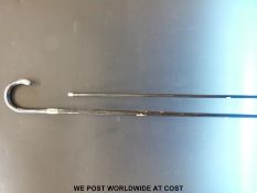 Two canes, one with silver top engraved A Godfrey, London Road,