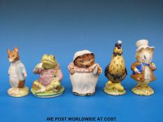 Five Beatrix Potter figures to include Jeremy Fisher, Johnny Town -Mouse, The Amiable Guinea-Pig,