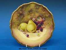 A Royal Worcester painted fruit plate with gadrooned gilt rim,