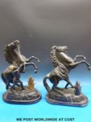 A pair of spelter figures of rearing horses (height 41cm)