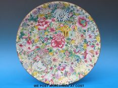 An early 20thC Chinese millefiori charger with Quianlong four character mark
