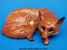 Beswick curled fox
