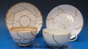 An early Worcester 'Dr Wall' period tea bowl and saucer together with a tea cup and saucer,