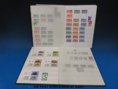 A stockbook of past 1935, 1937 and 1953 Commonwealth omnibus issues,